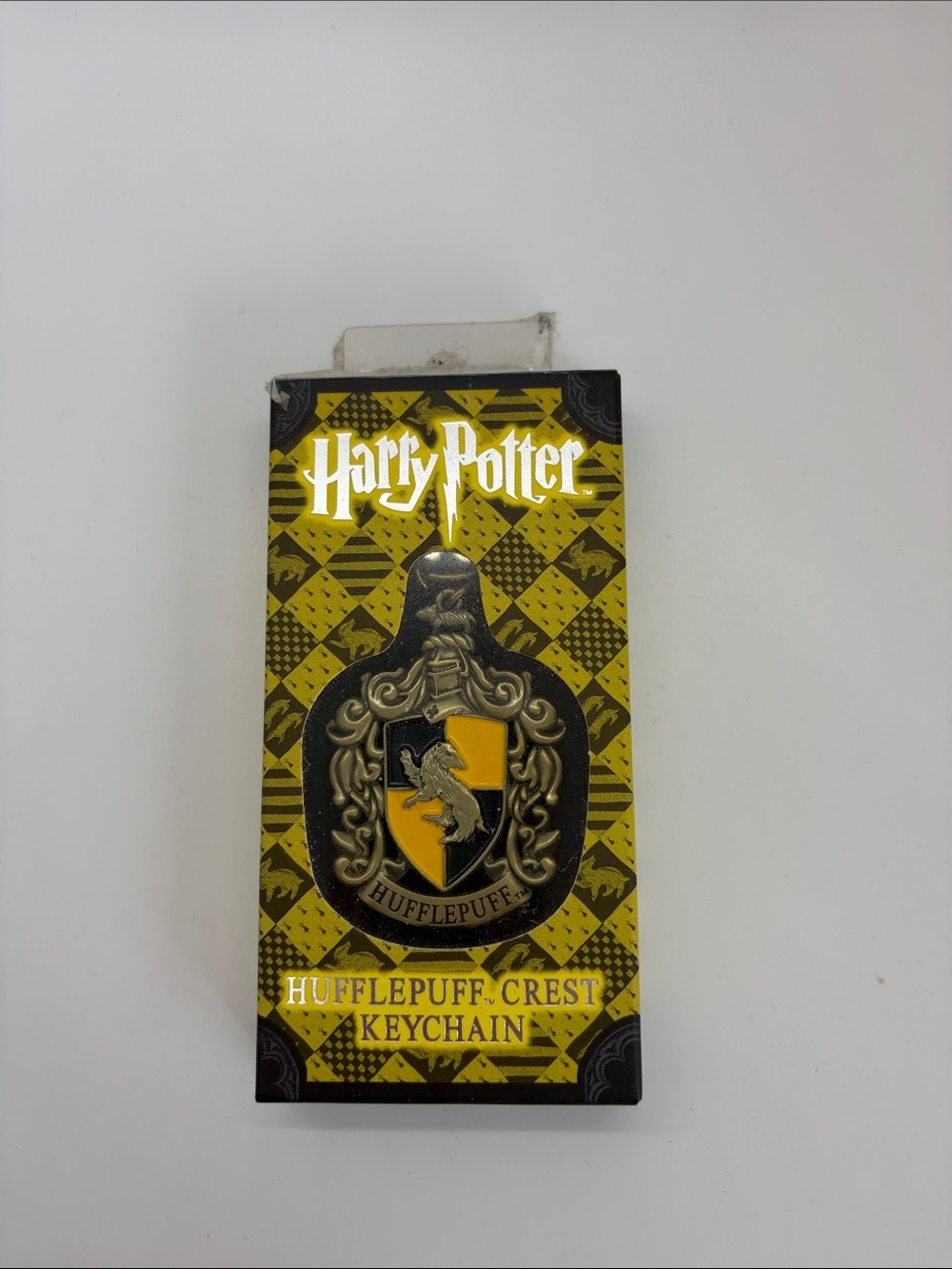 Warner Bros. Harry Potter Hufflepuff Crest Keychain - Yellow & Black